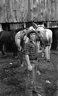 People: Cowboys with horses at a ranch in the USA. December 1980 80-07236 People: Cowboys with horses at a ranch in the USA. December 1980 80-07236