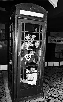 Twenty people set a record for squeezing into a telephone box. January 1978 Twenty people set a record for squeezing into a telephone box. January 1978