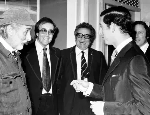 Peter Sellers and his two partners from the Goons meet Prince Charles at a function Peter Sellers and his two partners from the Goons meet Prince Charles at a function