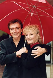 Petula Clark and David Cassidy under umbrella at photocall - July 1993 Petula Clark and David Cassidy under umbrella at photocall - July 1993