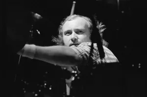 Phil Collins, drummer, actor, singer and songwriter, performing as drummer for his long Phil Collins, drummer, actor, singer and songwriter, performing as drummer for his long