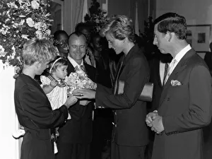 Phil Collins singer with wife Jill and daughter Lily in 1990 meet Princess Diana Phil Collins singer with wife Jill and daughter Lily in 1990 meet Princess Diana