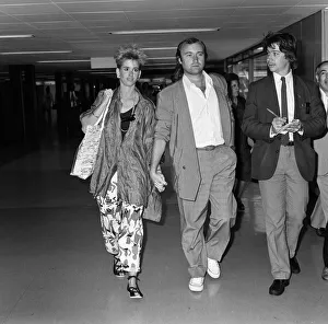 Phil Collins and his wife Jill at LAP to catch a flight to Greece. 1st September 1985 Phil Collins and his wife Jill at LAP to catch a flight to Greece. 1st September 1985