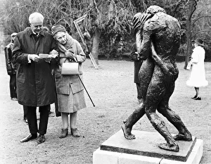 A photograph of an elderly couple viewing the sculpture 'Eternity I I" A photograph of an elderly couple viewing the sculpture 'Eternity I I"