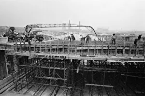 Pictured, workmen put last minute touches to a section of the M6 Gravelly Hill Pictured, workmen put last minute touches to a section of the M6 Gravelly Hill