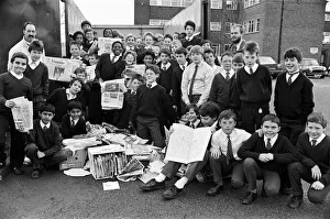 Piles of paper, these pupils from Almondbury High School have been helping to collect six Piles of paper, these pupils from Almondbury High School have been helping to collect six