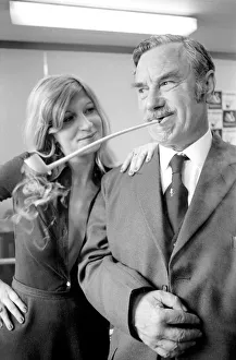 Pipe smoking Champion Robert Locke of Hayes, Middlesex, is pursued by typist Liliana Pipe smoking Champion Robert Locke of Hayes, Middlesex, is pursued by typist Liliana