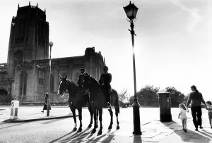 Police mounted on horses patrol the area around Liverpool Anglican Cathedral Police mounted on horses patrol the area around Liverpool Anglican Cathedral