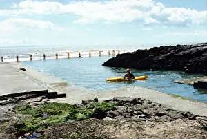 A pool, set amongst the rocks, at Porthcawl front. 8th June 1994 A pool, set amongst the rocks, at Porthcawl front. 8th June 1994
