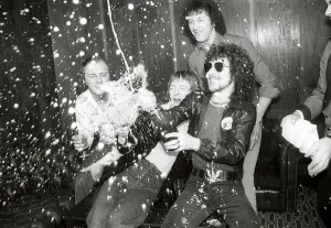Pop band Black Lace enjoy a bottle of champagne after victory in the Eurovison song Pop band Black Lace enjoy a bottle of champagne after victory in the Eurovison song