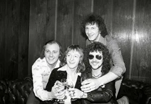 Pop band Black Lace enjoy a bottle of champagne after victory in the Eurovison song Pop band Black Lace enjoy a bottle of champagne after victory in the Eurovison song