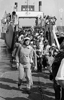 Images Dated 28th August 1970: Pop fans leaving the ferry on arrival at The Isle of Wight. 28th August 1970