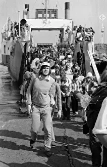 Pop fans leaving the ferry on arrival at The Isle of Wight. 28th August 1970 Pop fans leaving the ferry on arrival at The Isle of Wight. 28th August 1970