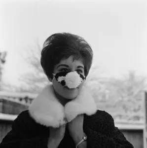 Pop singer Helen Shapiro wearing a 'Nosey Cosey' Pop singer Helen Shapiro wearing a 'Nosey Cosey'