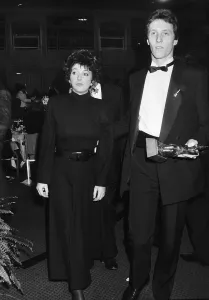 Pop singer Kate Bush arrives at an award ceremony in London with A mystery man Pop singer Kate Bush arrives at an award ceremony in London with A mystery man