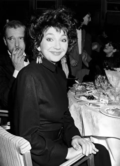 Pop singer Kate Bush sitting at a dinner table February 1987 Pop singer Kate Bush sitting at a dinner table February 1987