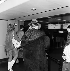 Pop star Elton John pictured showing off his pony tail as he arrives at London' Pop star Elton John pictured showing off his pony tail as he arrives at London'