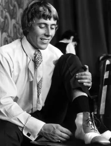 Pop Star Ray Phillips of the Nashville Teens tries on some hand made shoes in Chelsea Pop Star Ray Phillips of the Nashville Teens tries on some hand made shoes in Chelsea