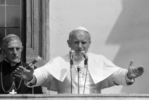 Pope John Paul II gives a blessing from a balcony during his visit to Ireland Pope John Paul II gives a blessing from a balcony during his visit to Ireland