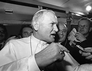Pope John Paul II is interviewed during a flight on his visit to Ireland Pope John Paul II is interviewed during a flight on his visit to Ireland