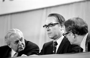 Prime mInister Harold Wilson talks to cabinet members during a debate on the Common Prime mInister Harold Wilson talks to cabinet members during a debate on the Common