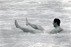 Images Dated 11th March 1979: Prince Charles bathes of the coast of Australia. Prince of Wales sitting in