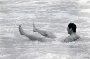 Prince Charles bathes of the coast of Australia. Prince of Wales sitting in Prince Charles bathes of the coast of Australia. Prince of Wales sitting in