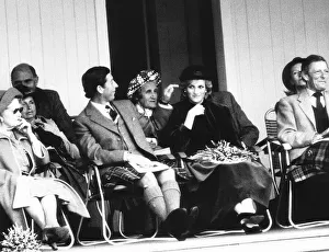 Prince Charles caresses the hair of Princess Diana during the annual Braemar Highland Prince Charles caresses the hair of Princess Diana during the annual Braemar Highland