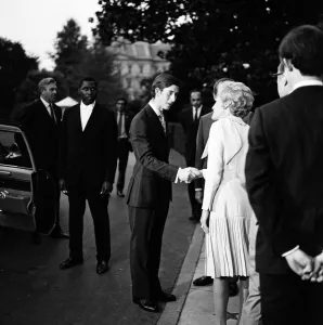 Prince Charles departs the White House, watched by President Richard Nixon and family Prince Charles departs the White House, watched by President Richard Nixon and family