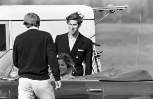 Prince Charles goes for a drive in his Aston Martin with a mystery girl companion at Prince Charles goes for a drive in his Aston Martin with a mystery girl companion at
