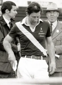 Prince Charles mopping his brow with hankie during a tough Polo match - showing bald Prince Charles mopping his brow with hankie during a tough Polo match - showing bald