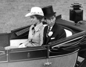 Prince Charles, Prince of Wales with his sister Princess Anne drive down the course at Prince Charles, Prince of Wales with his sister Princess Anne drive down the course at