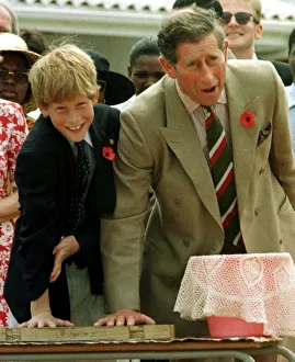 Prince Charles with his son Prince Harry leaving their hand prints in concrete on their Prince Charles with his son Prince Harry leaving their hand prints in concrete on their