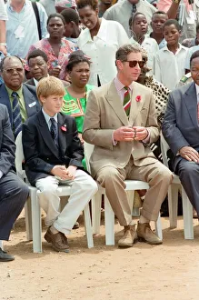 Prince Charles and his son Prince Harry visit the village of Dukuduku in South Africa Prince Charles and his son Prince Harry visit the village of Dukuduku in South Africa