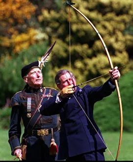 Prince Charles trys his hand at archery with the Royal Company of Archers Prince Charles trys his hand at archery with the Royal Company of Archers