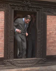 Prince Charles walking through a low temple door Feb 1998 during his visit to Prince Charles walking through a low temple door Feb 1998 during his visit to