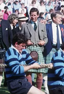 Images Dated 1st September 1989: Prince Charles watching the tug of war at the Braemar Highland Games September 1989