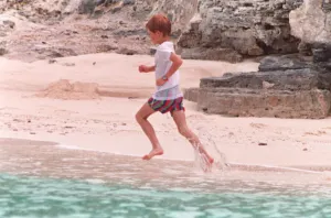 PRINCE HARRY RUNNING ALONG BEACH DURING HOLIDAY IN BAHAMAS - 1993 PRINCE HARRY RUNNING ALONG BEACH DURING HOLIDAY IN BAHAMAS - 1993