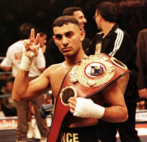Prince Naseem Hamed gives victory sign after defeating Remigio Molina to retain his World Prince Naseem Hamed gives victory sign after defeating Remigio Molina to retain his World
