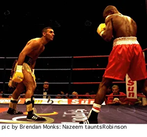 Prince Naseem Hamed taunts Steve Robinson during WBO featherweight championship fight at Prince Naseem Hamed taunts Steve Robinson during WBO featherweight championship fight at