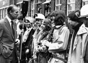Prince Philip, Duke of Edinburgh shares a joke with members of venture groups whom he met Prince Philip, Duke of Edinburgh shares a joke with members of venture groups whom he met