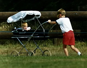 Prince William Collection 1989 Princess Beatrice in pram being pushed by her cousin Prince William Collection 1989 Princess Beatrice in pram being pushed by her cousin