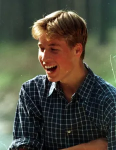 Prince William at River Dee, Balmoral, August 1997 Wearing checked shirt open necked Prince William at River Dee, Balmoral, August 1997 Wearing checked shirt open necked