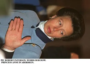 Princess Anne in Aberdeen wearing blue jacket hand in front Princess Anne in Aberdeen wearing blue jacket hand in front