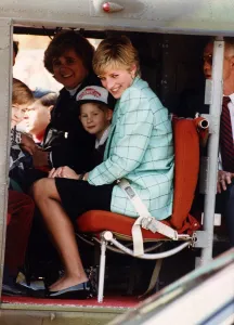 Princess Diana with Prince Harry and William board a Candian military helicopter after Princess Diana with Prince Harry and William board a Candian military helicopter after