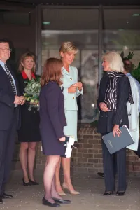 PRINCESS DIANA, PRINCESS OF WALES AND HER NEW SECRETARY, LOUISE REID-CARR (BEHIND PRINCESS DIANA, PRINCESS OF WALES AND HER NEW SECRETARY, LOUISE REID-CARR (BEHIND