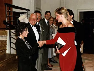 Princess Diana shakes hands with actress Joan Collins after a charity performance of Princess Diana shakes hands with actress Joan Collins after a charity performance of