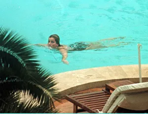 Princess Diana swimming in the pool while on holiday at Richard Branson' Princess Diana swimming in the pool while on holiday at Richard Branson'