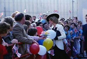 Images Dated 14th October 1985: Princess Diana talks to crowds as she arrives at Yarrow Shipbuilders Ltd in Scotstoun