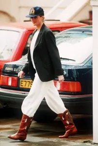 Princess Diana wearing an unusual combination of white trousers, boots Princess Diana wearing an unusual combination of white trousers, boots